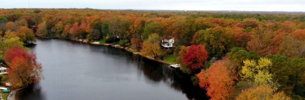 Medford lakes ariel view of lake during fall foliage
